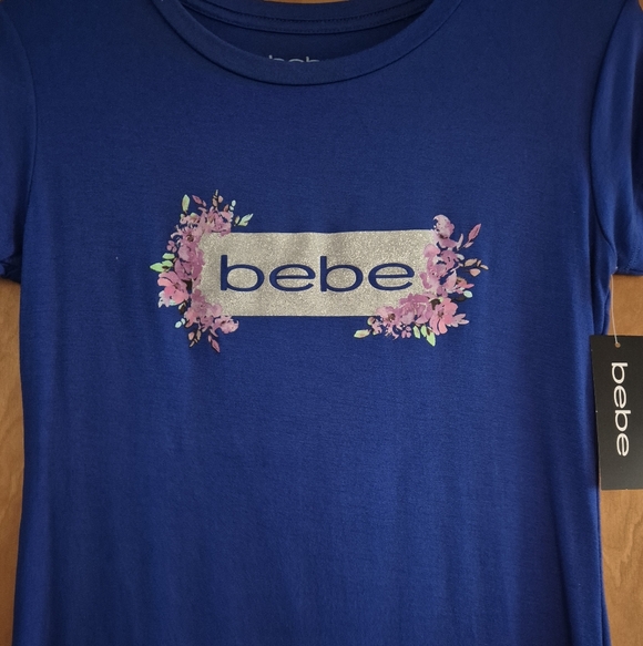 Bebe Blue Graphic T-Shirt, size M - Picture 2 of 10